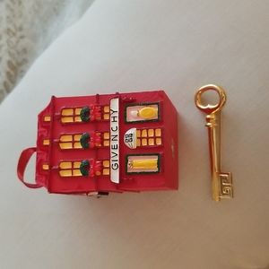 Givenchy pin & Christmas Ornament